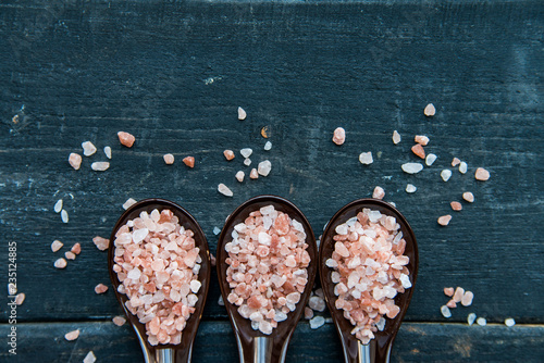 Studio shot of three spoons of pink himalayan salt