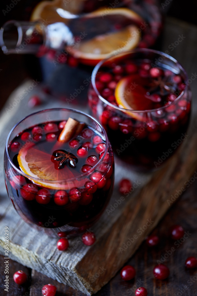 high angle view of homemade mulled wine with cranberries on table in kitchen