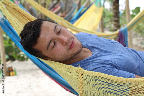 Serene man enjoying a hammock