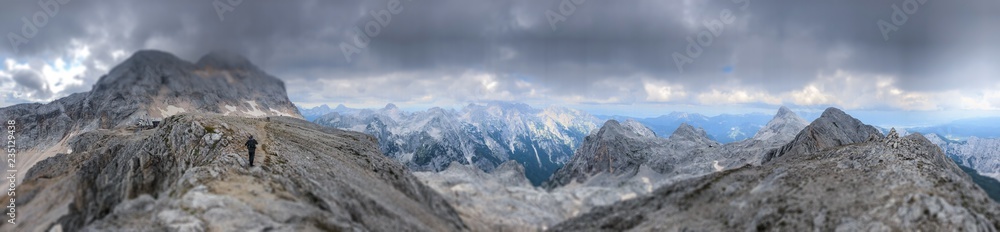 Fototapeta premium Landscape view from path leading to highest Slovenian mountain Triglav at 2864m. Mountain at left side is Triglav.