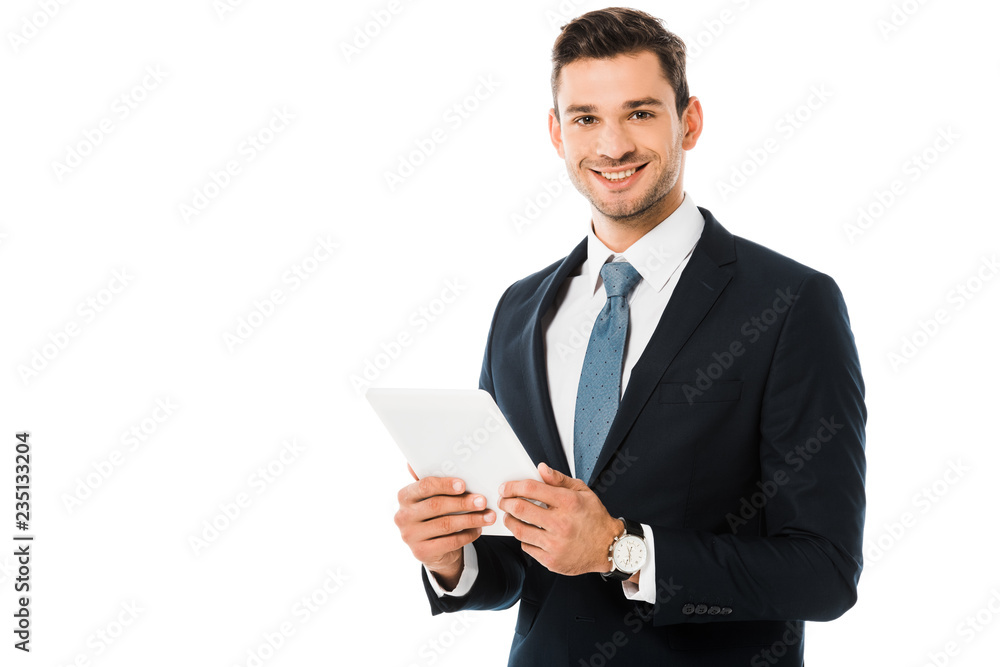 handsome smiling businessman holding digital tablet isolated on white