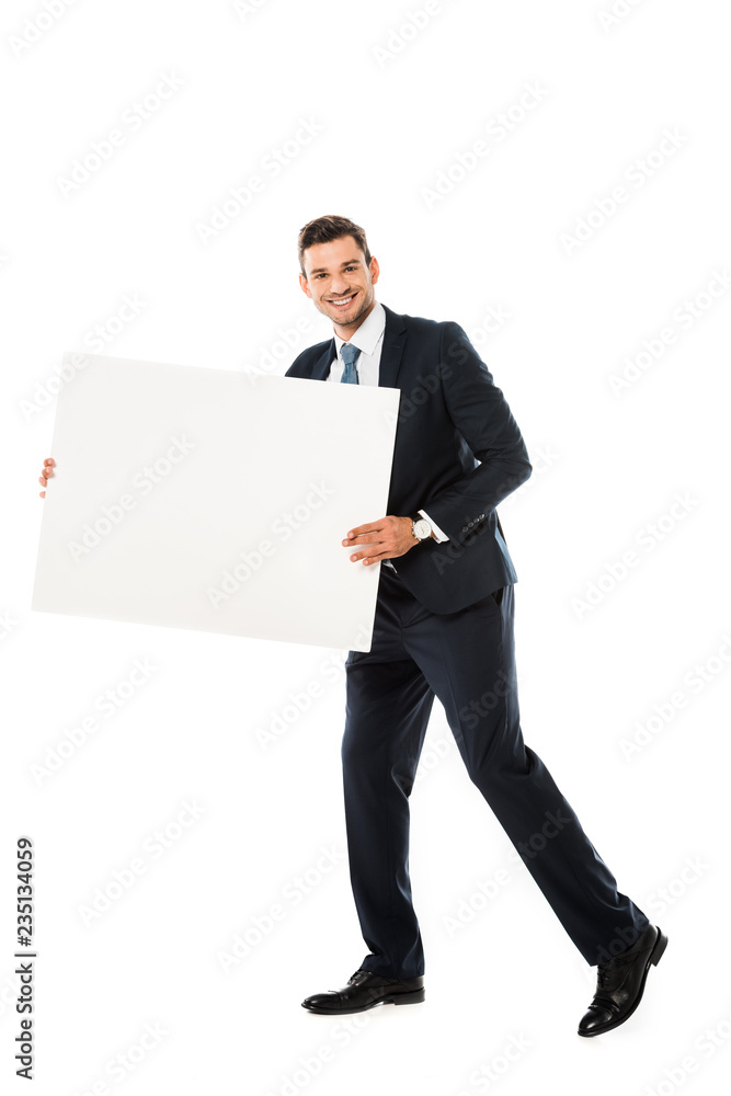smiling businessman in suit showing blank poster with copy space isolated on white smiling businessman in suit showing blank poster with copy space isolated on white