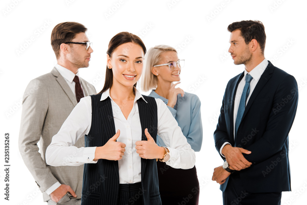 successful businesswoman showing thumbs up and standing with colleagues isolated on white successful businesswoman showing thumbs up and standing with colleagues isolated on white