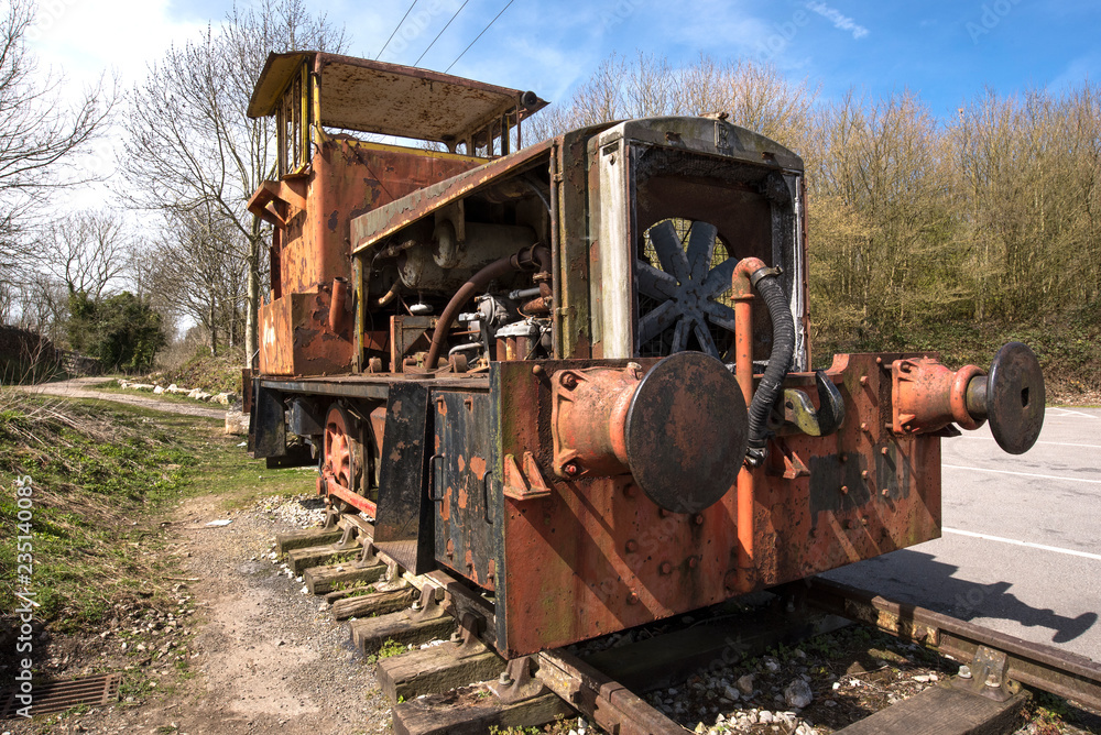 Old obsolete diesel train on a track