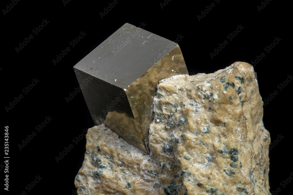 Macro Pyrite mineral stone on black background Macro Pyrite mineral stone on black background