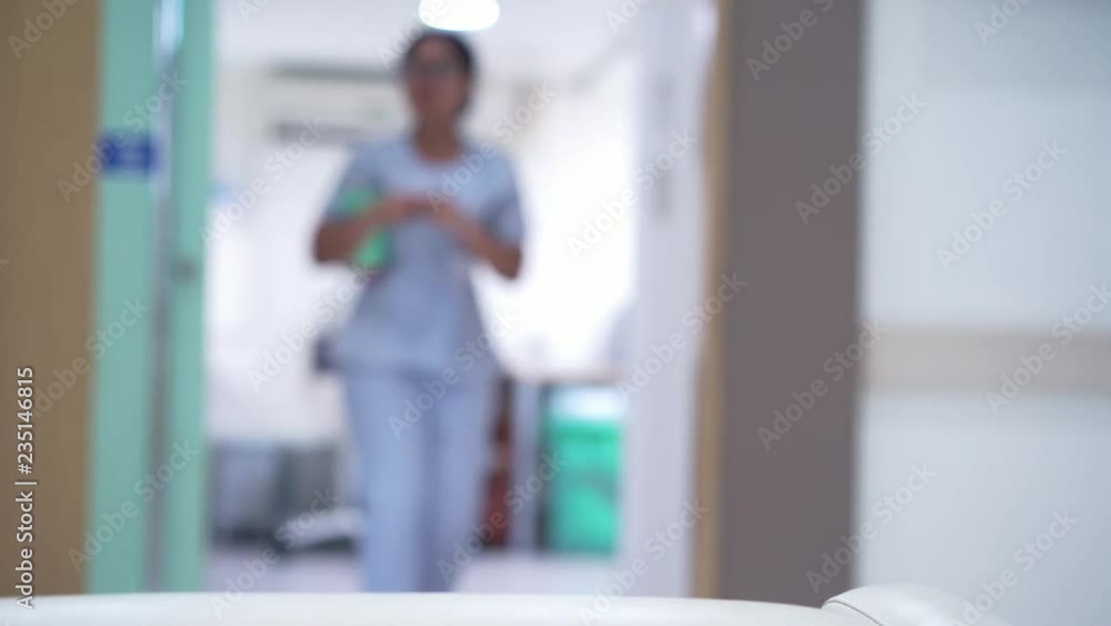 Blurred shot of nurse walking and operating in hospital,Slow motion Blurred shot of nurse walking and operating in hospital,Slow motion