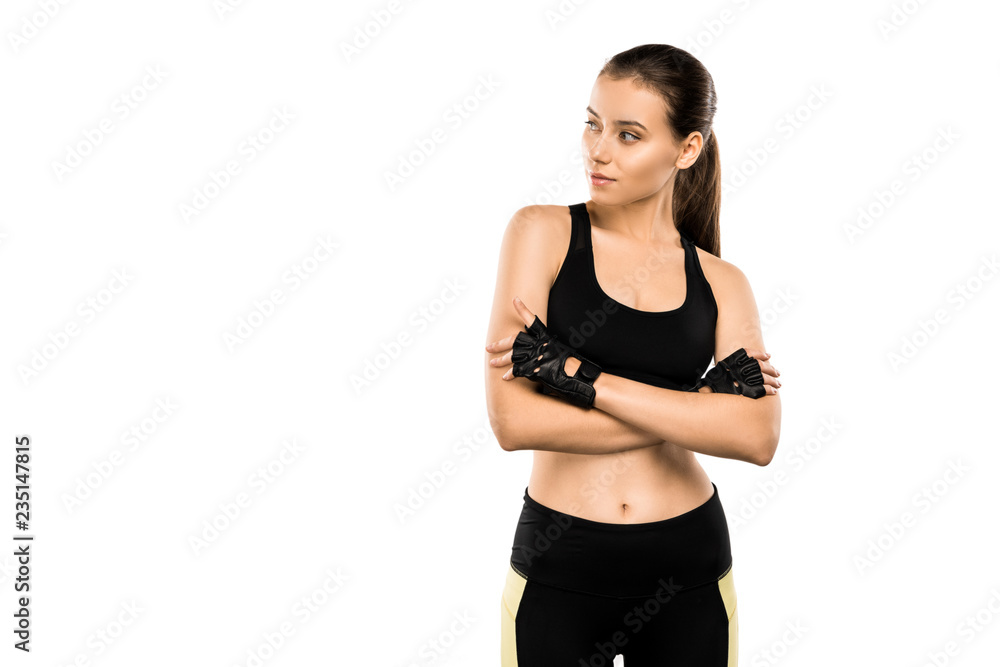 beautiful sportswoman in weightlifting gloves with arms crossed isolated on white beautiful sportswoman in weightlifting gloves with arms crossed isolated on white