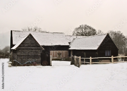 old barns in the snow