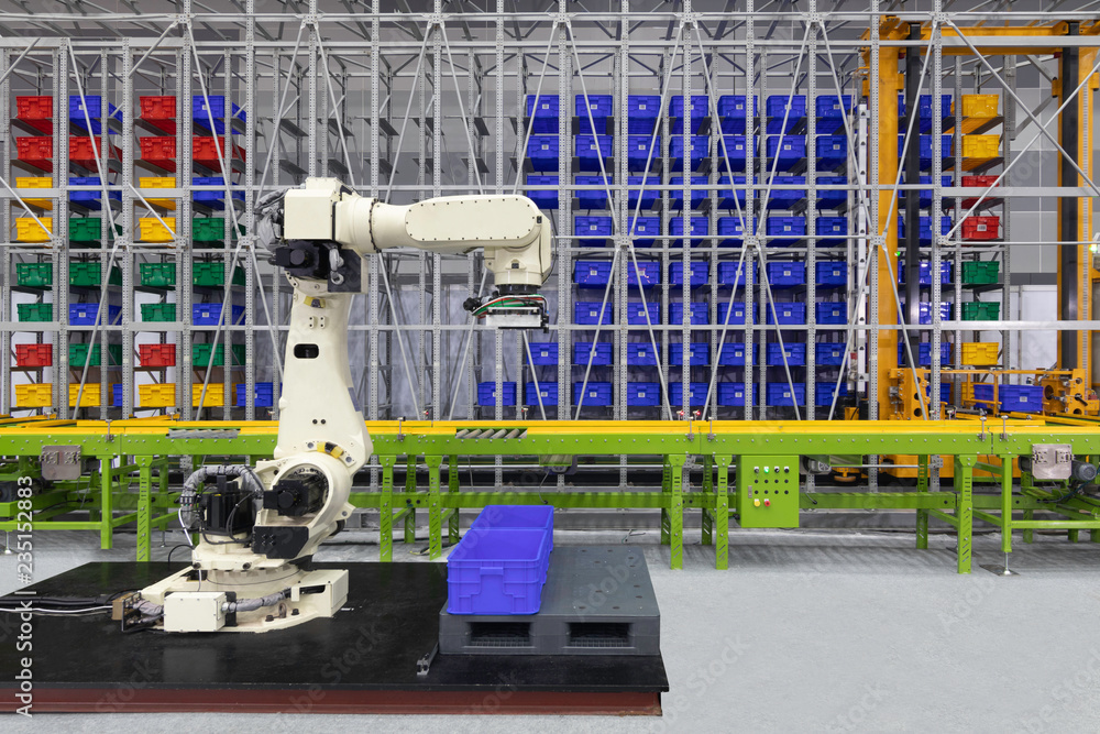 Robot for logistic warehouse. robotic arm loading plastic crates on
