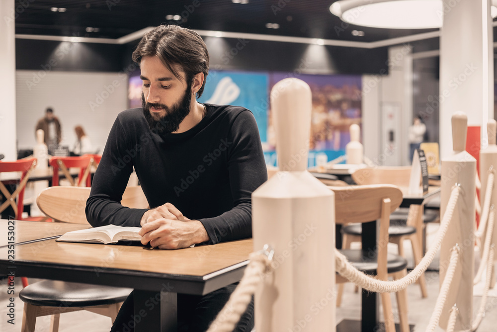 Modern man reads a book Modern man reads a book