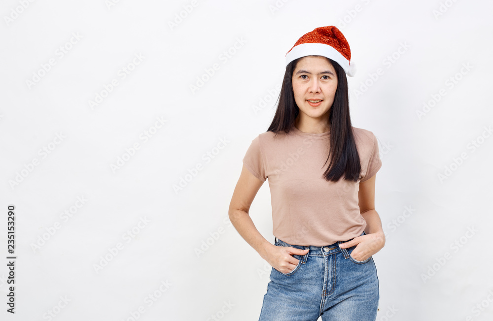Christmas girl in santa hat on a white Christmas girl in santa hat on a white