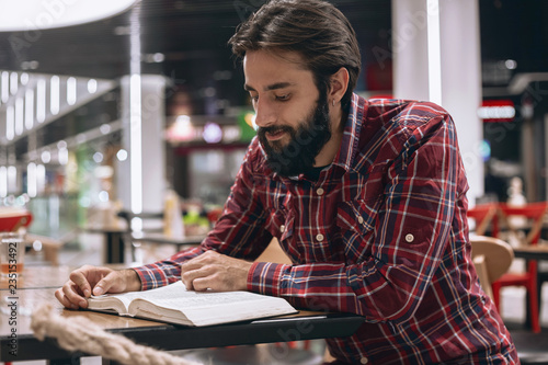 Modern man reads a book