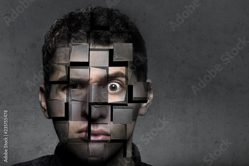 portrait of a man with a puzzled look that breaks down into cubes, the concept of trouble and self-destruction