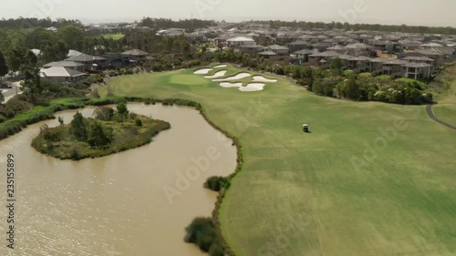 A golf cart driving along a Golf Range