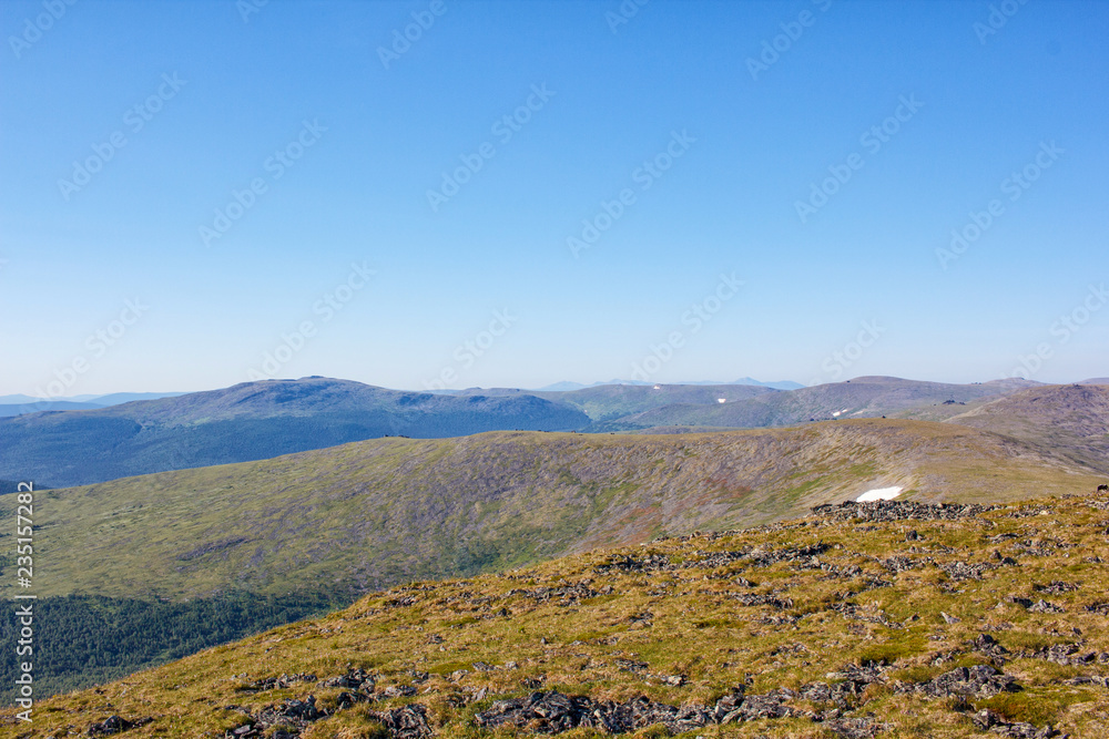 Magnificent mountain slope. Journey to the mountains. Nature of the Northern Urals. Beautiful view.