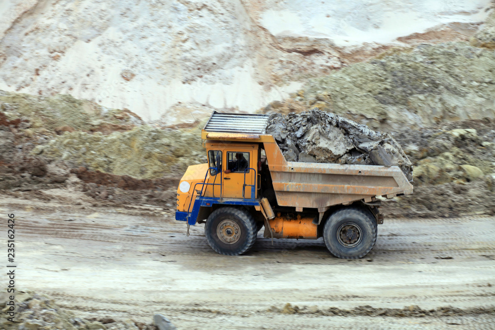 heavy machinery works in industrial quarry