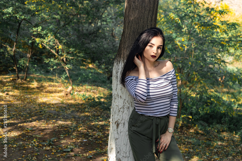 Autumn woman portrait outdoors at the park Autumn woman portrait outdoors at the park