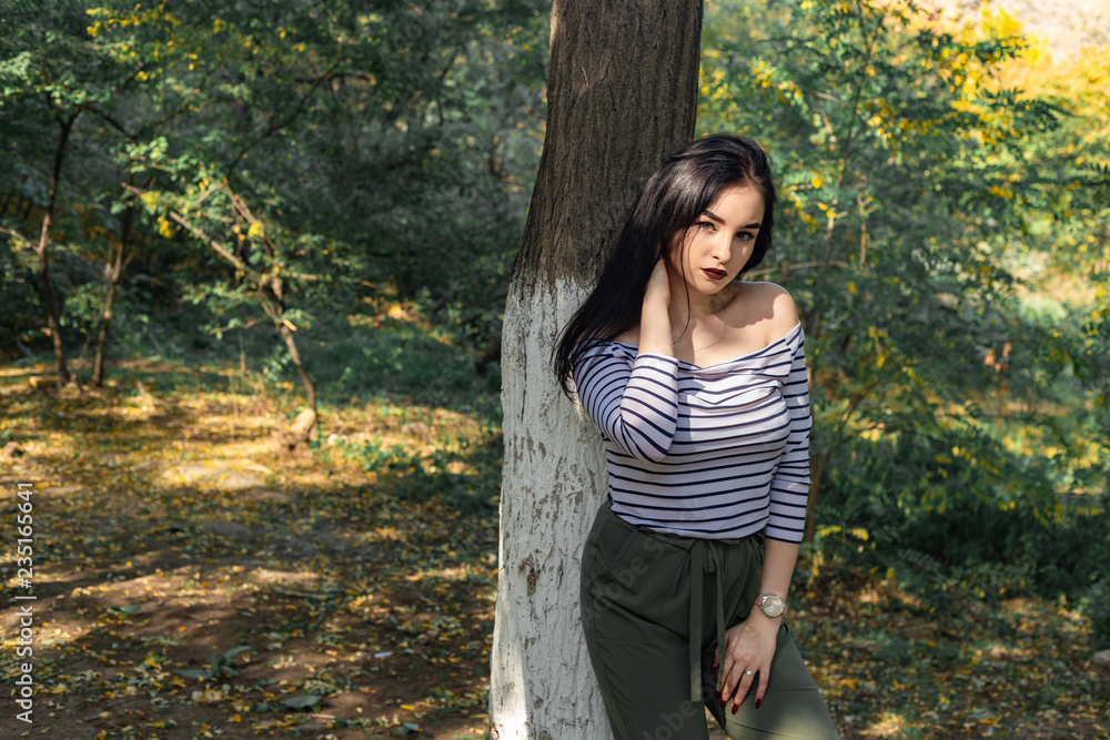 Autumn woman portrait outdoors at the park Autumn woman portrait outdoors at the park