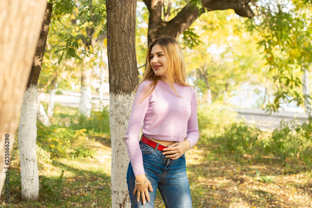 Autumn woman portrait outdoors at the park Autumn woman portrait outdoors at the park