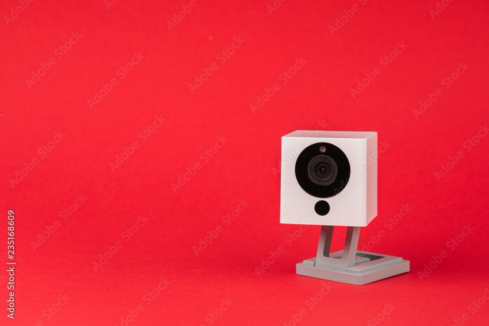 white webcam on red background, object, Internet, technology concept. white webcam on red background, object, Internet, technology concept.