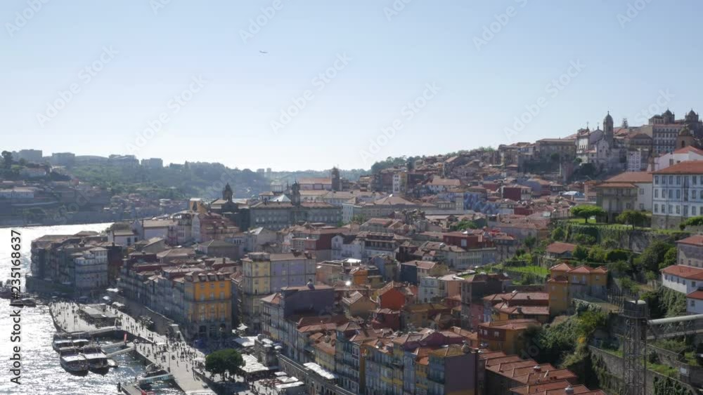 Aerial view of Porto, Portugal , Douro riverfront, on sunny day. Aerial view of Porto, Portugal , Douro riverfront, on sunny day.
