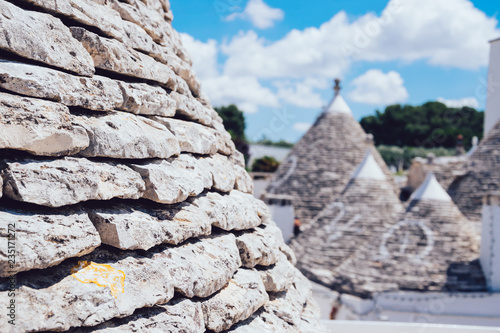 Detail of Alberobello's famous Trulli, the characteristic cone-roofed houses of the Itria Valley, Apulia, Southern Italy.