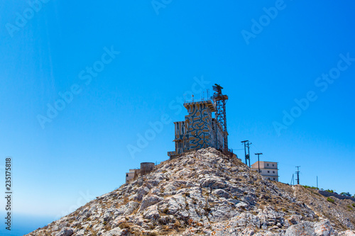 Communication-tower on a hill in Santorini