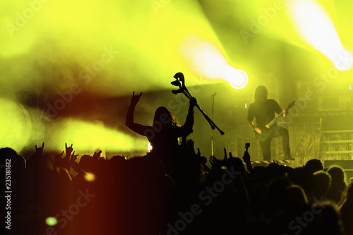 Wallpaper Mural Silhouette of a young man with crutches on top of a crowd enjoying in concert Torontodigital.ca