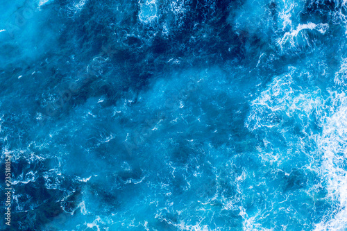 Картината върху платно Crystal blue ocean waves aerial view background texture