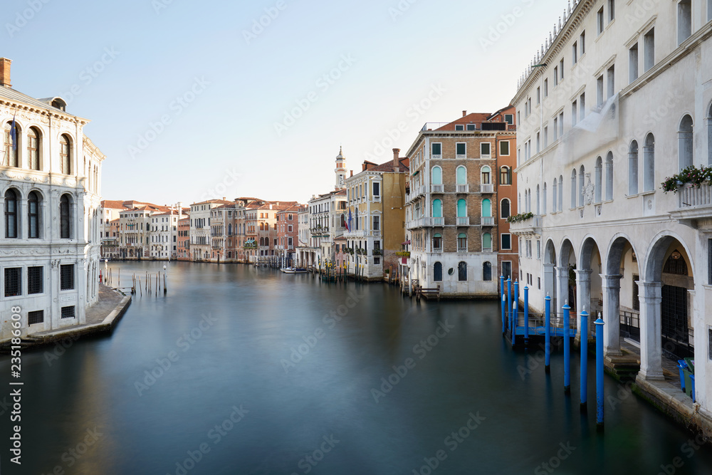 Grand Canal in Venice, calm water in the early morning in summer in Italy