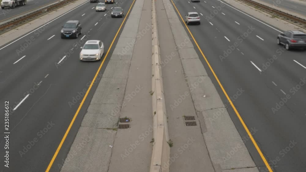 Looking down at highway with traffic. Gardiner Expressway in Toronto, Ontario, Canada.