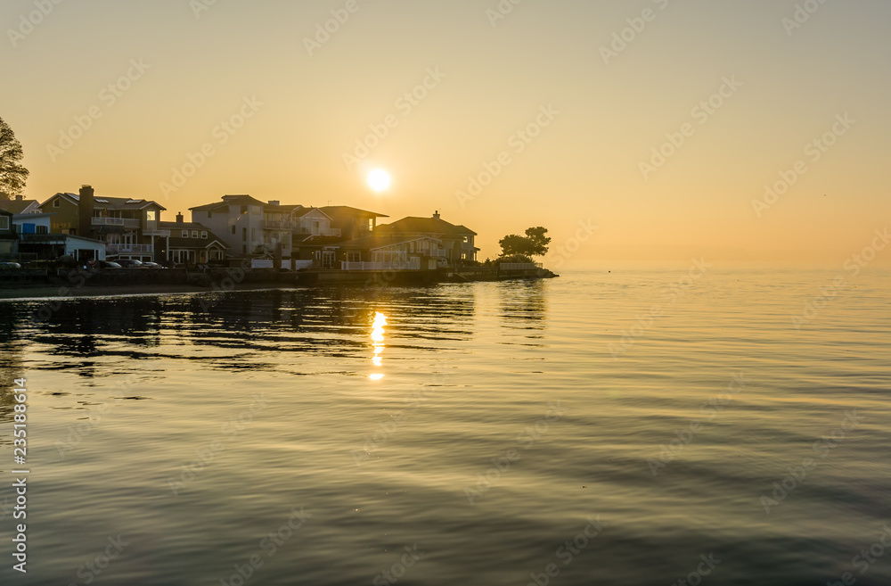 Sun Over Waterfront Homes
