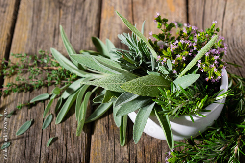 spice leaves on old wood table
