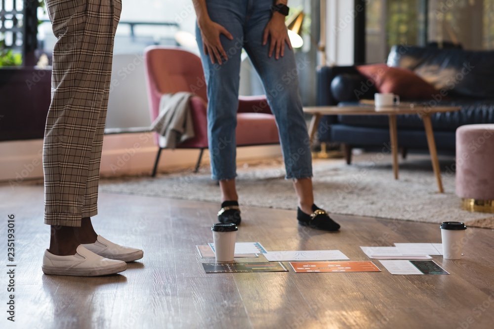 Document and coffee on floor Document and coffee on floor