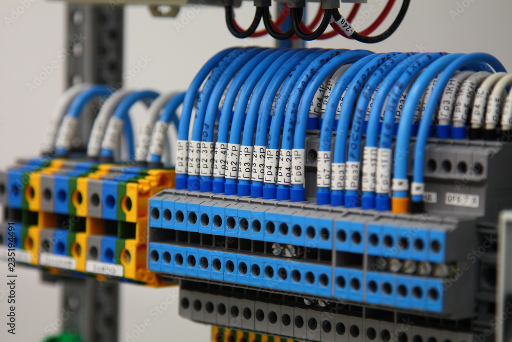 Connecting through-pass electrical terminals in the electrical panel ...