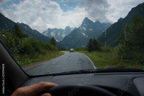 Tourist traveling in a car. Caucasus Mountains