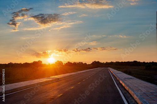 Empty asphalt road blue sky and sunset backgroung with copy space
