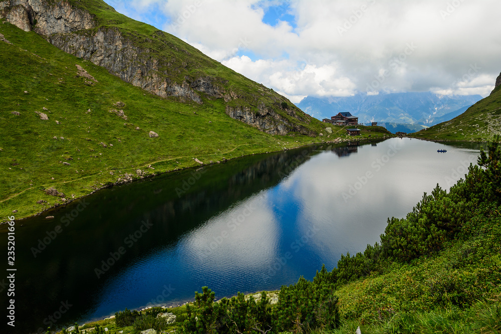 Beautiful landscape with Wildsee Lake ( Wildseelodersee ) and  the Wildseeloderhaus, mountain refuge hut, above Fieberbrunn in the Kitzbuhel Alps, Tirol, Austria