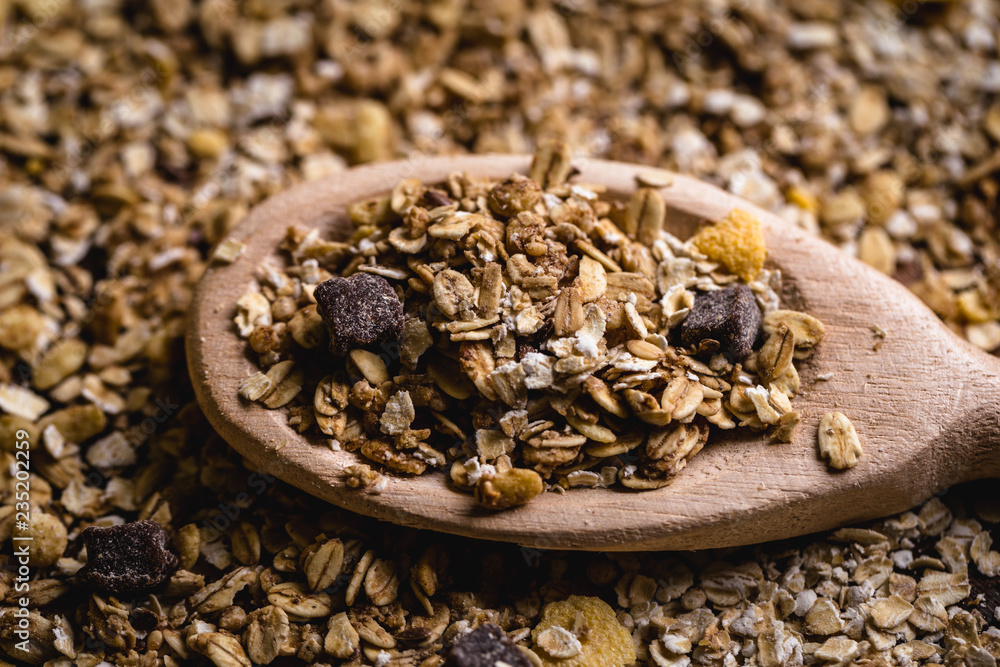 wooden spoon with oats, cereal and seeds. wooden spoon with oats, cereal and seeds.