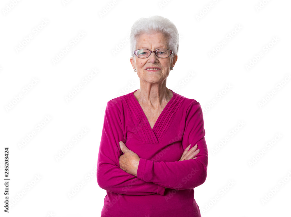 senior woman with pink sweater and white hair on white background senior woman with pink sweater and white hair on white background