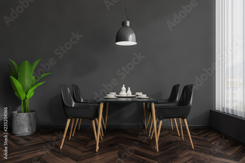 Gray cafe interior, black chairs