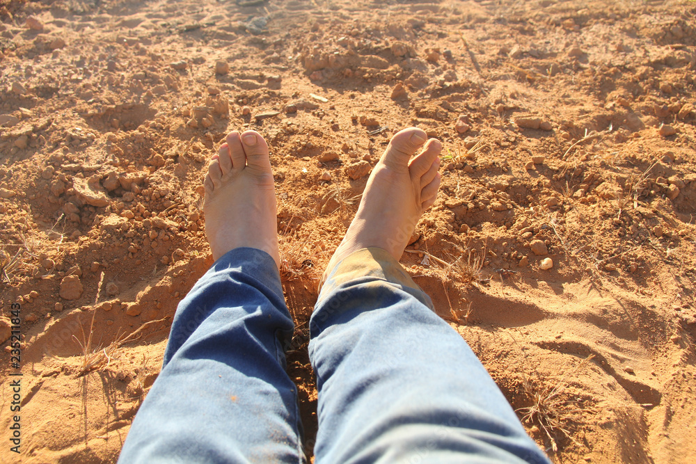 Fototapeta premium feet in sand