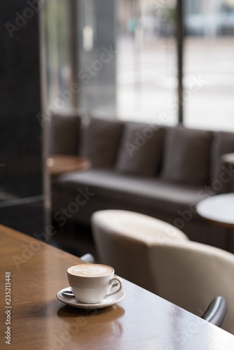 Wallpaper Mural Coffee cup on table in hotel Torontodigital.ca