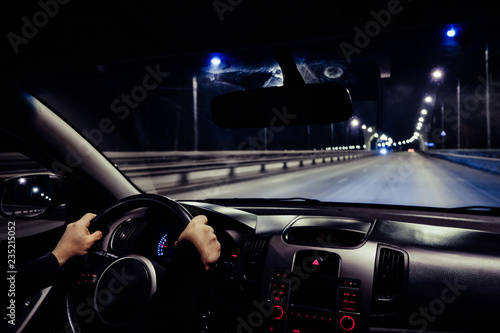 driving a car at night on the way
