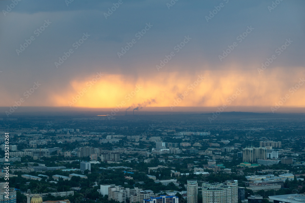 Almaty Skyline during a Sunset Rain, Kazakhstan in August 2018taken in hdr taken in hdr