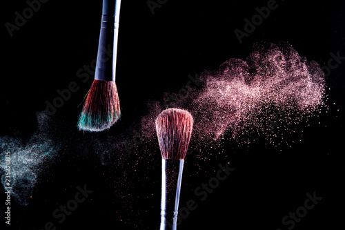 Makeup brush on black background