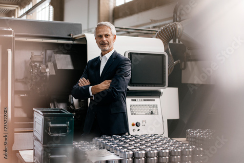 Portrait of a successful entrepreneur in his company photo