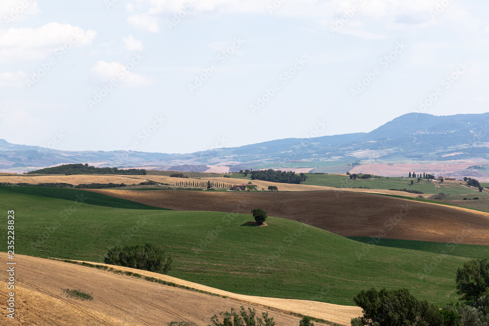 Fototapeta premium landscape with green hills and blue sky