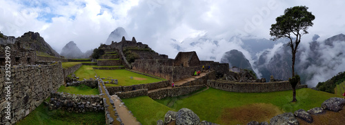 Mysterious atmosphere in the morning at Machu Picchu  the lost city of the Incas on a cloudy day