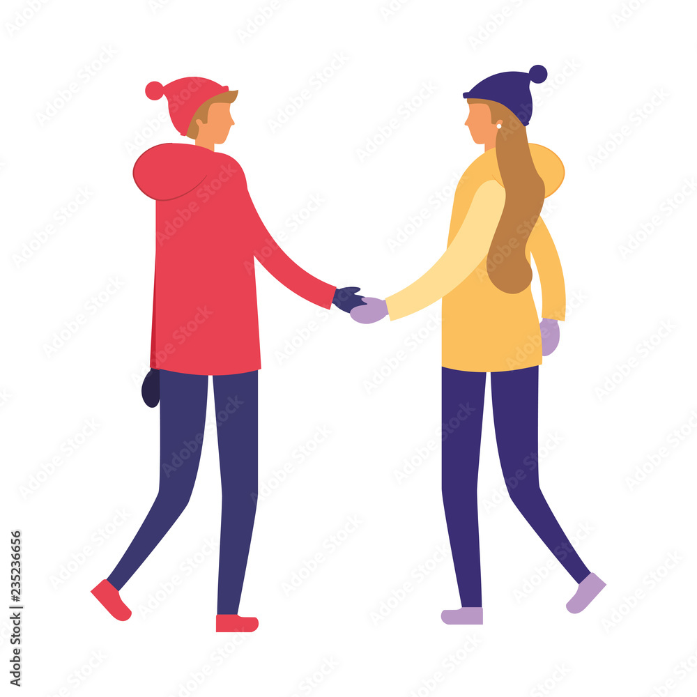 couple holding hands with winter clothes couple holding hands with winter clothes